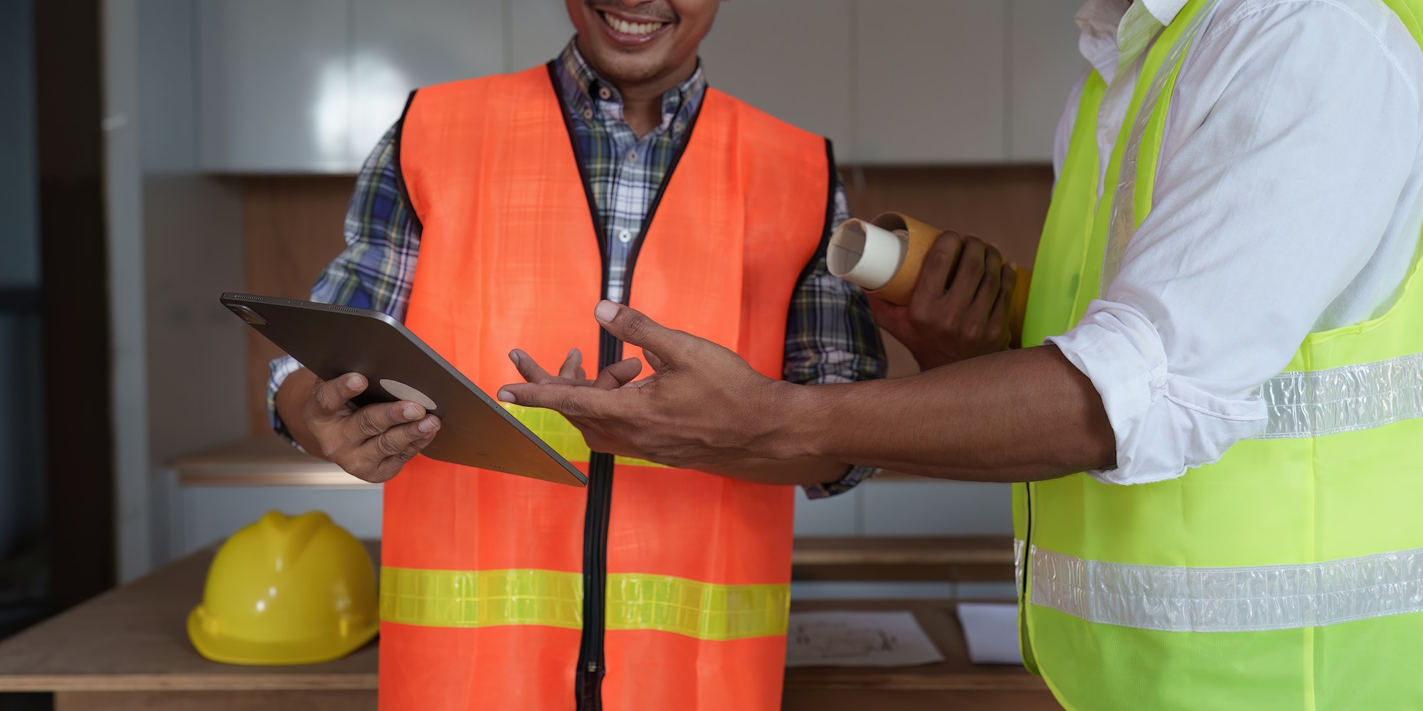 Professional architect designer structural engineer team colleagues discussing building plan design